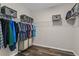 Spacious walk-in closet with ample shelving and hanging space for clothing and accessories at 3610 Charmed Ln, St Cloud, FL 34772