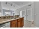 Modern kitchen with granite countertops, stainless steel appliances, and ample storage space at 4004 Santa Maria Dr # 105, Kissimmee, FL 34741