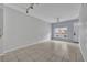 Open-concept living space with tile floors, offering lots of light, and providing a versatile layout for comfortable living at 4004 Santa Maria Dr # 105, Kissimmee, FL 34741