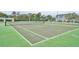 Well-maintained tennis court within the community, offering recreational opportunities for residents to enjoy outdoor play at 4004 Santa Maria Dr # 105, Kissimmee, FL 34741