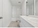 Modern bathroom with double sinks and shower-tub combo at 4026 Copperleaf Ln, Poinciana, FL 34759