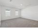 Bright room with two windows and neutral carpet at 4026 Copperleaf Ln, Poinciana, FL 34759