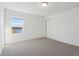 Bedroom features a window with a view and a closet at 4026 Copperleaf Ln, Poinciana, FL 34759