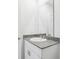 Bathroom featuring white cabinets and granite counter top at 4031 Cooperleaf Ln, Poinciana, FL 34759