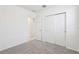Bedroom with carpet and a closet at 4031 Cooperleaf Ln, Poinciana, FL 34759