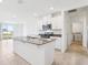 Beautiful kitchen featuring granite countertops, stainless steel appliances and bright white cabinetry at 4031 Cooperleaf Ln, Poinciana, FL 34759