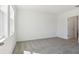 Bright bedroom with neutral carpet and plenty of natural light at 4034 Copperleaf Ln, Poinciana, FL 34759