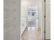 Hallway featuring closet space leading to bedroom and bathroom at 4034 Copperleaf Ln, Poinciana, FL 34759