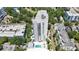 An aerial view shows a tall condominium complex with a swimming pool, parking, and views of the surrounding cityscape at 530 E Central Blvd # 102, Orlando, FL 32801