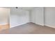 Spacious bedroom with neutral carpet, white trim, and a convenient closet for ample storage at 530 E Central Blvd # 102, Orlando, FL 32801