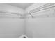 Walk-in closet features installed shelving and ample storage space at 530 E Central Blvd # 102, Orlando, FL 32801