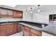 Kitchen featuring granite countertops, stainless steel appliances, and breakfast bar at 530 E Central Blvd # 102, Orlando, FL 32801