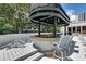 Outdoor bar area with seating, perfect for enjoying refreshments by the pool at 530 E Central Blvd # 102, Orlando, FL 32801