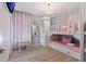 Light and bright bedroom with a bunk bed and carriage mural at 5414 Oakgrain Ct, Davenport, FL 33837