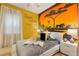 Bedroom featuring a Lion King mural and comfortable bedding at 5414 Oakgrain Ct, Davenport, FL 33837
