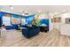 Spacious Gathering room with Neverland mural and comfortable seating at 5414 Oakgrain Ct, Davenport, FL 33837