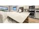 White quartz countertops and stainless steel appliances highlight this kitchen at 5414 Oakgrain Ct, Davenport, FL 33837