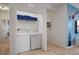 Convenient laundry room with washer and dryer at 5414 Oakgrain Ct, Davenport, FL 33837