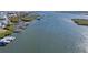 Aerial view of waterfront properties with boat docks at 6815 Engram Rd, New Smyrna Beach, FL 32169
