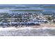 Aerial view showcasing a house's location near the beach at 6815 Engram Rd, New Smyrna Beach, FL 32169