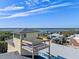 Elevated deck with water views overlooking the neighborhood at 6815 Engram Rd, New Smyrna Beach, FL 32169