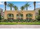 Welcoming Vista Cay resort entrance featuring lush landscaping and an elegant gated entry at 8013 Cool Breeze Dr # 116, Orlando, FL 32819