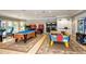 Fun game room with pool table, air hockey, and arcade games for residents at 8013 Cool Breeze Dr # 116, Orlando, FL 32819