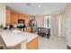 Modern kitchen with stainless steel appliances and light wood cabinets at 8013 Cool Breeze Dr # 116, Orlando, FL 32819