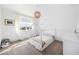 Cozy bedroom with a unique bed frame, natural light, and neutral carpet, creating a serene atmosphere at 10231 Beechwood Ln, Orlando, FL 32832