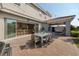 Charming outdoor patio with dining area, covered lounge, and seamless connection to indoor spaces at 10231 Beechwood Ln, Orlando, FL 32832