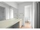 Clean and bright bathroom with a long vanity countertop and lots of space at 10305 Licorice Way, Orlando, FL 32821