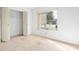 Bright bedroom with large closet, neutral carpet and a big window overlooking the neighborhood at 10305 Licorice Way, Orlando, FL 32821