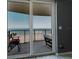 Beautiful beach view from condo balcony with seating at 111 S Atlantic Ave # 301, Ormond Beach, FL 32176