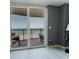 Balcony view featuring sliding glass door with ocean and beach views at 111 S Atlantic Ave # 301, Ormond Beach, FL 32176