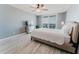 Beautiful bedroom with ocean view, ceiling fan and wood look floors at 111 S Atlantic Ave # 301, Ormond Beach, FL 32176
