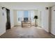 Lobby area features large window, bench seating, and elevator access for a welcoming arrival at 111 S Atlantic Ave # 301, Ormond Beach, FL 32176