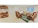 Inviting lobby with comfortable seating, featuring an island-style seating arrangement and tile floors at 111 S Atlantic Ave # 301, Ormond Beach, FL 32176