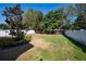 A large fenced-in backyard with plenty of room to enjoy outdoor activities at 1217 E Muriel St, Orlando, FL 32806