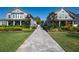 Townhouses with manicured lawns and landscaped pathway at 1217 E Muriel St, Orlando, FL 32806