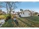 Backyard with a deck overlooking a pond at 124 Loon Ct, Daytona Beach, FL 32119
