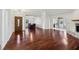 Open living and dining room with hardwood floors and ample natural light at 124 Loon Ct, Daytona Beach, FL 32119