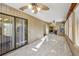 Spacious living room with sliding glass door access, tiled floor and an open design at 124 Loon Ct, Daytona Beach, FL 32119