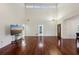 Open-concept living room with high ceilings and hardwood floors at 124 Loon Ct, Daytona Beach, FL 32119