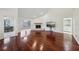 Spacious living room with hardwood floors and fireplace at 124 Loon Ct, Daytona Beach, FL 32119