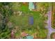 Aerial view showing home's location on the lot at 1356 Cupid Ave, Christmas, FL 32709
