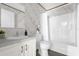 Modern bathroom with white fixtures and a bathtub at 1356 Cupid Ave, Christmas, FL 32709