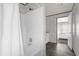 Clean bathroom with a shower/tub combo and white vanity at 1356 Cupid Ave, Christmas, FL 32709