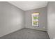 Bright bedroom with carpeted floor and a window offering natural light at 1356 Cupid Ave, Christmas, FL 32709