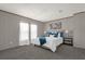 Spacious bedroom with large windows and a neutral color palette at 1356 Cupid Ave, Christmas, FL 32709