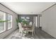 Bright dining area with four chairs and a round table at 1356 Cupid Ave, Christmas, FL 32709